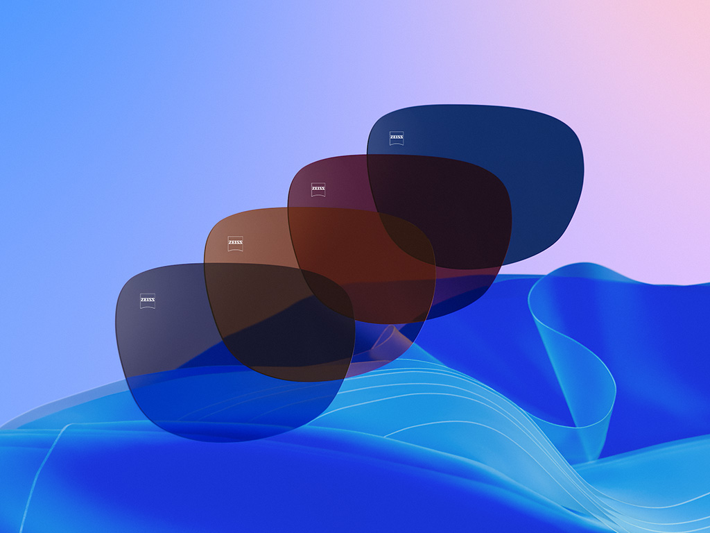 Ilustración CGI en 3D de cuatro lentes tintados en Dusk Grey, Copper Brown, Burgundy y Midnight Blue.