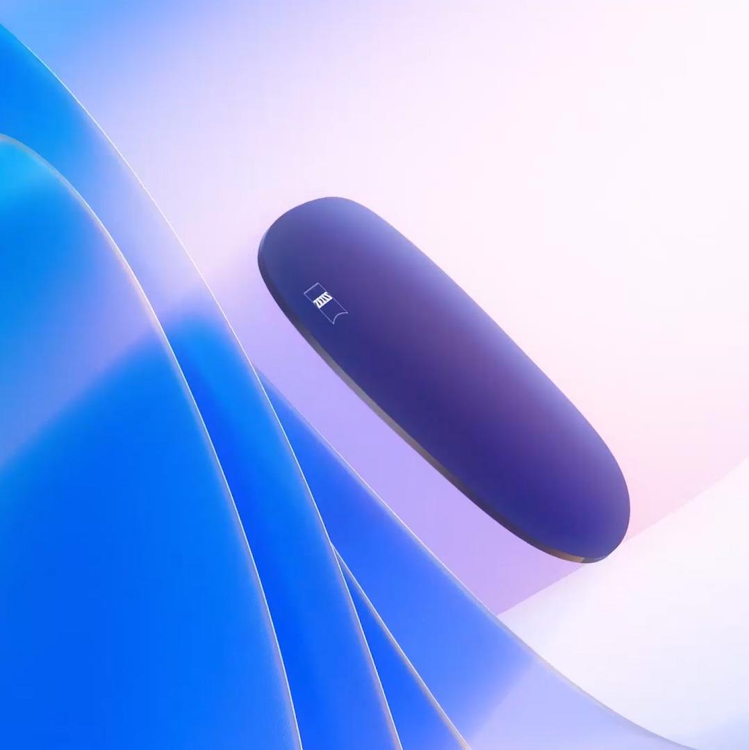 Ilustración CGI en 3D de un lente tintado flotando hacia una fuente de luz, que bloquea eficazmente los nocivos rayos UV.