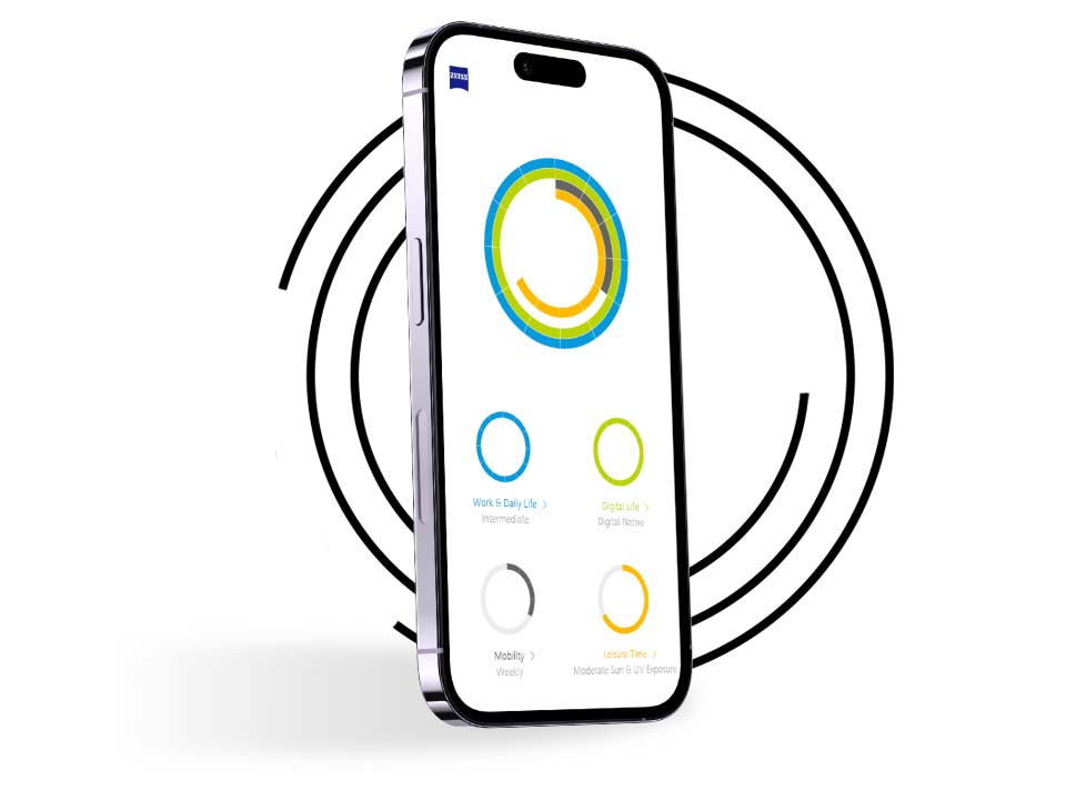 Un smartphone delante de anillos negros muestra el perfil de visión de un usuario de Mi perfil visual con anillos de distintos colores. 