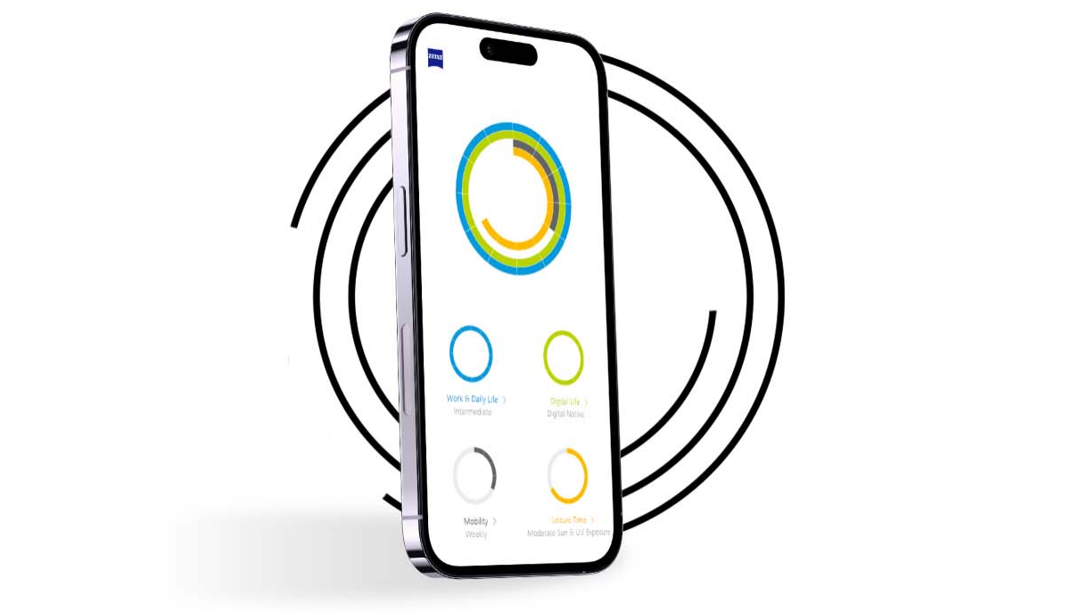 Un smartphone delante de anillos negros muestra el perfil de visión de un usuario de Mi perfil visual con anillos de distintos colores. 
