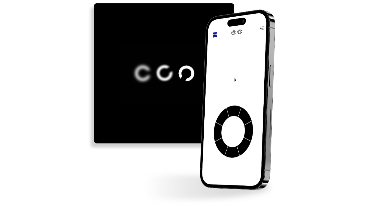 Un smartphone con una pantalla de un ejercicio de examen de la vista en línea de ZEISS, frente a un botón cuadrado negro que muestra círculos de diferente nitidez con una abertura en distintas direcciones, utilizados habitualmente en los exámenes de la vista.