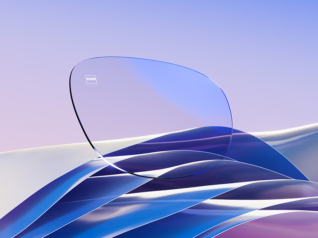 Representación por CGI de un lente transparente con un sutil reflejo azul.