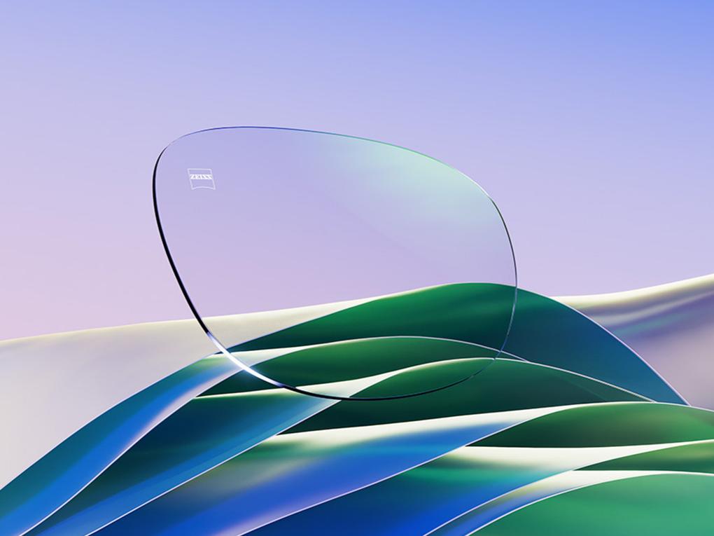 Representación por CGI de un lente transparente con un sutil reflejo verde