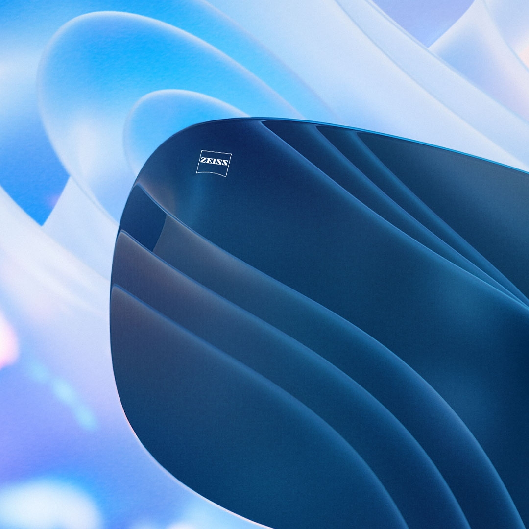 Se muestra una representación por CGI de un lente tintado que bloquea el deslumbramiento de forma visible en el fondo.