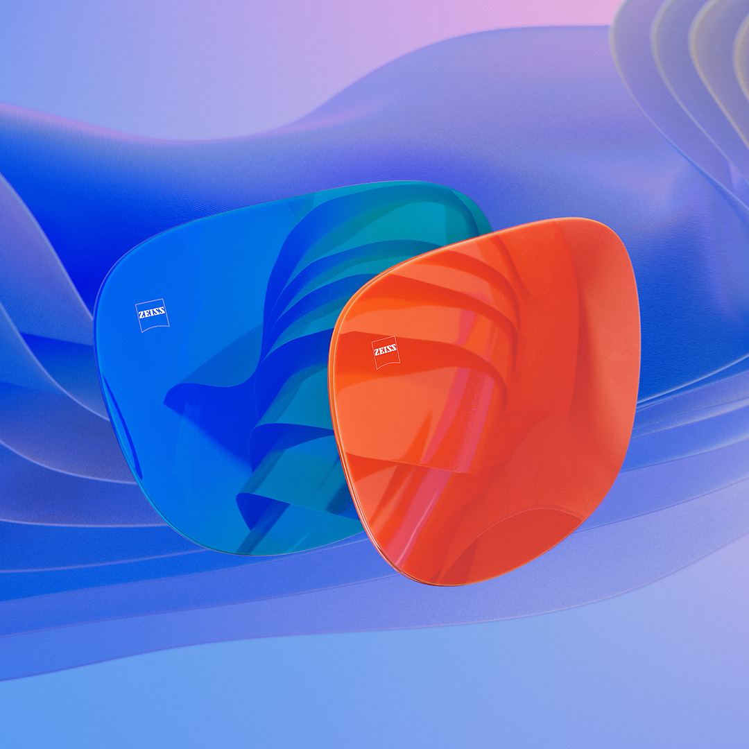 Una representación por CGI de lentes de gafas de sol con frontales espejados en azul y naranja.