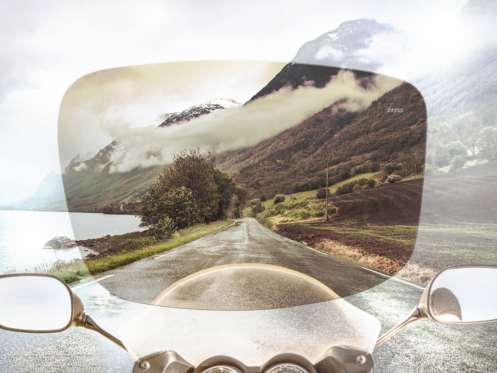 Vista de la calle y el paisaje desde la perspectiva del conductor a través de los lentes para gafas de sol Skylet de ZEISS 